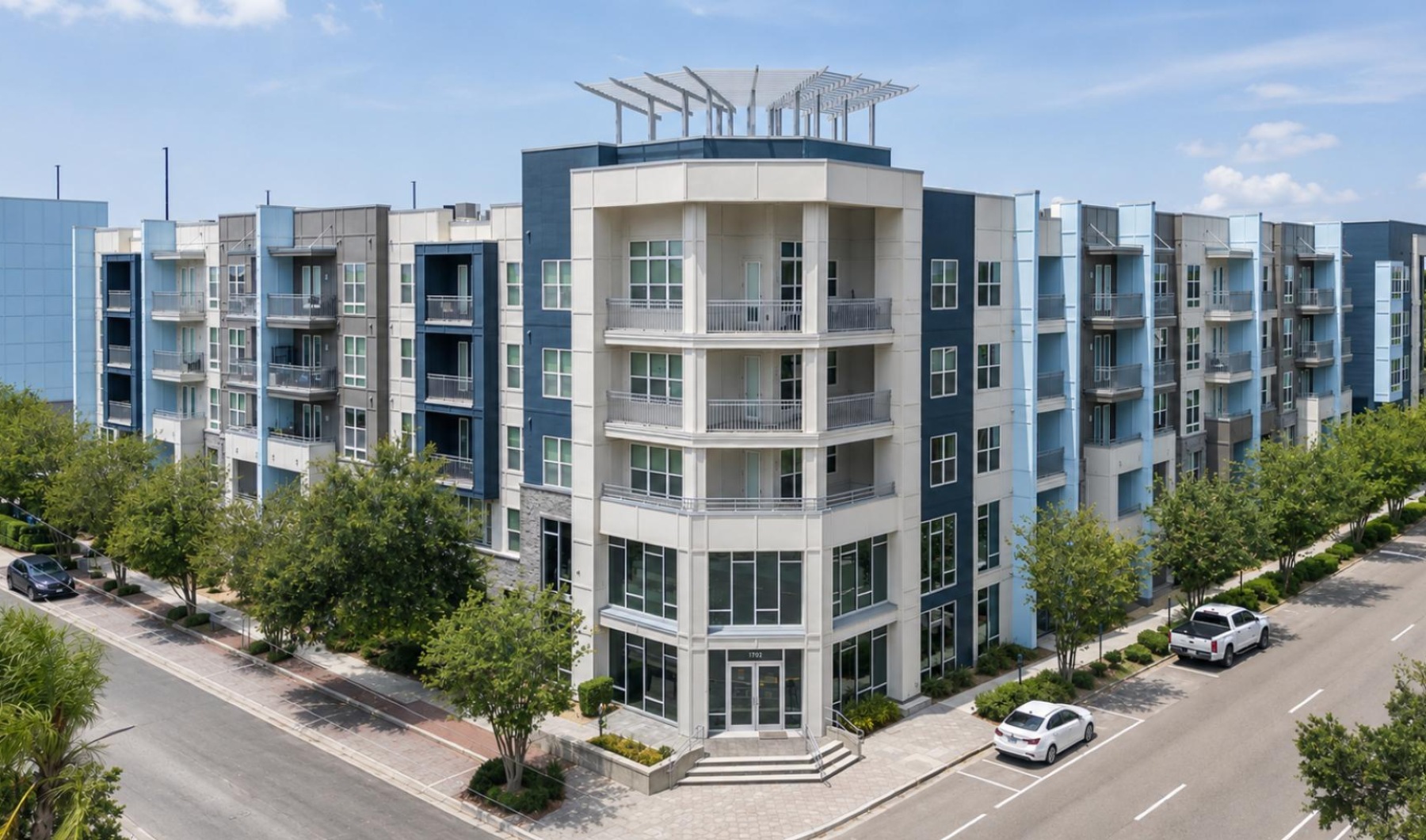 a building with cars parked in front