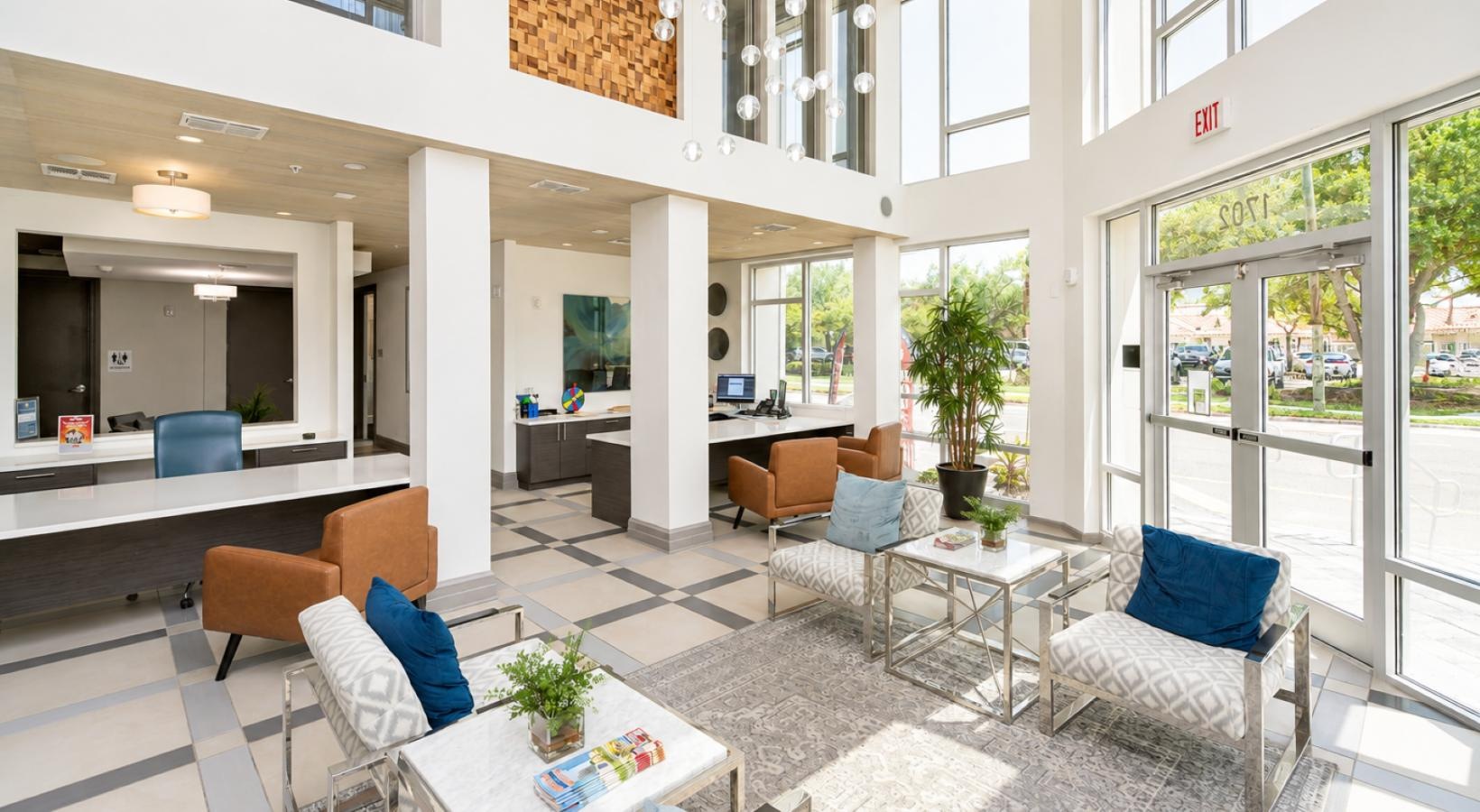 a room with a table chairs and a couch
