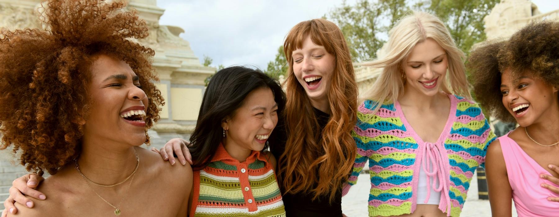 a group of women smiling
