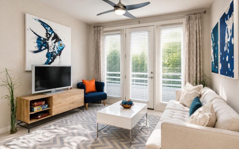 a living room with a tv and a couch
